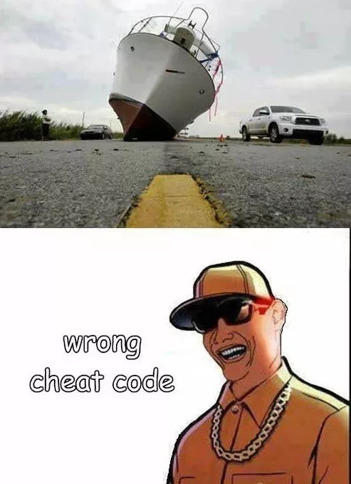 meme about using cheat codes in GTA showing a boat stranded on a road with the caption 'Oops, wrong code'