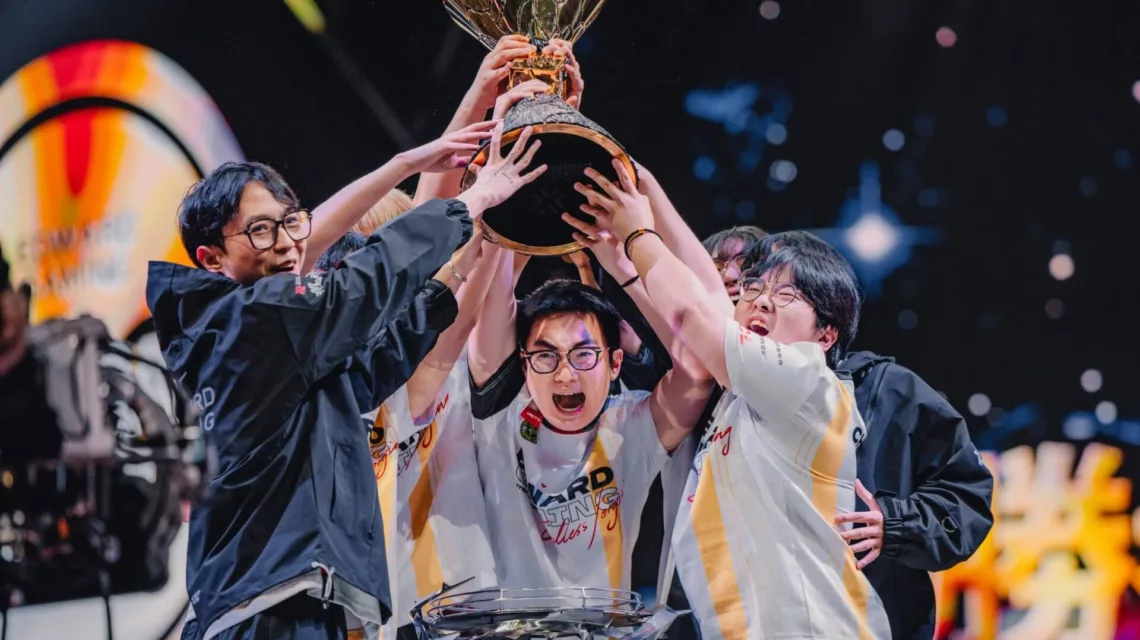 Photo of the Edward Gaming team lifting the Valorant Champions 2024 trophy